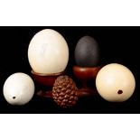 NATURAL HISTORY - A COLLECTION OF OSTRICH, RHEN AND EMU EGGS two on stands, together with a large