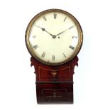 A REGENCY MAHOGANY CONVEX DIAL FUSEE WALL CLOCK the slim moulded surround above a figured and