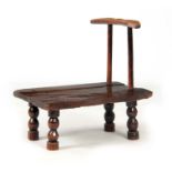 AN EARLY 18TH CENTURY COUNTRY MADE FRUITWOOD WORKMAN'S STOOL having superb colour and patina, the