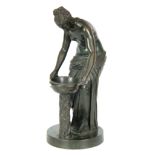 A 19TH CENTURY GREEN PATINATED GREEK STYLE FIGURAL BRONZE SCULPTURE depicting a half-nude female