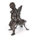 A LATE 19TH CENTURY PATINATED BRONZE SCULPTURE OF A CHERUB AND GOOSE 33cm high 34cm wide.