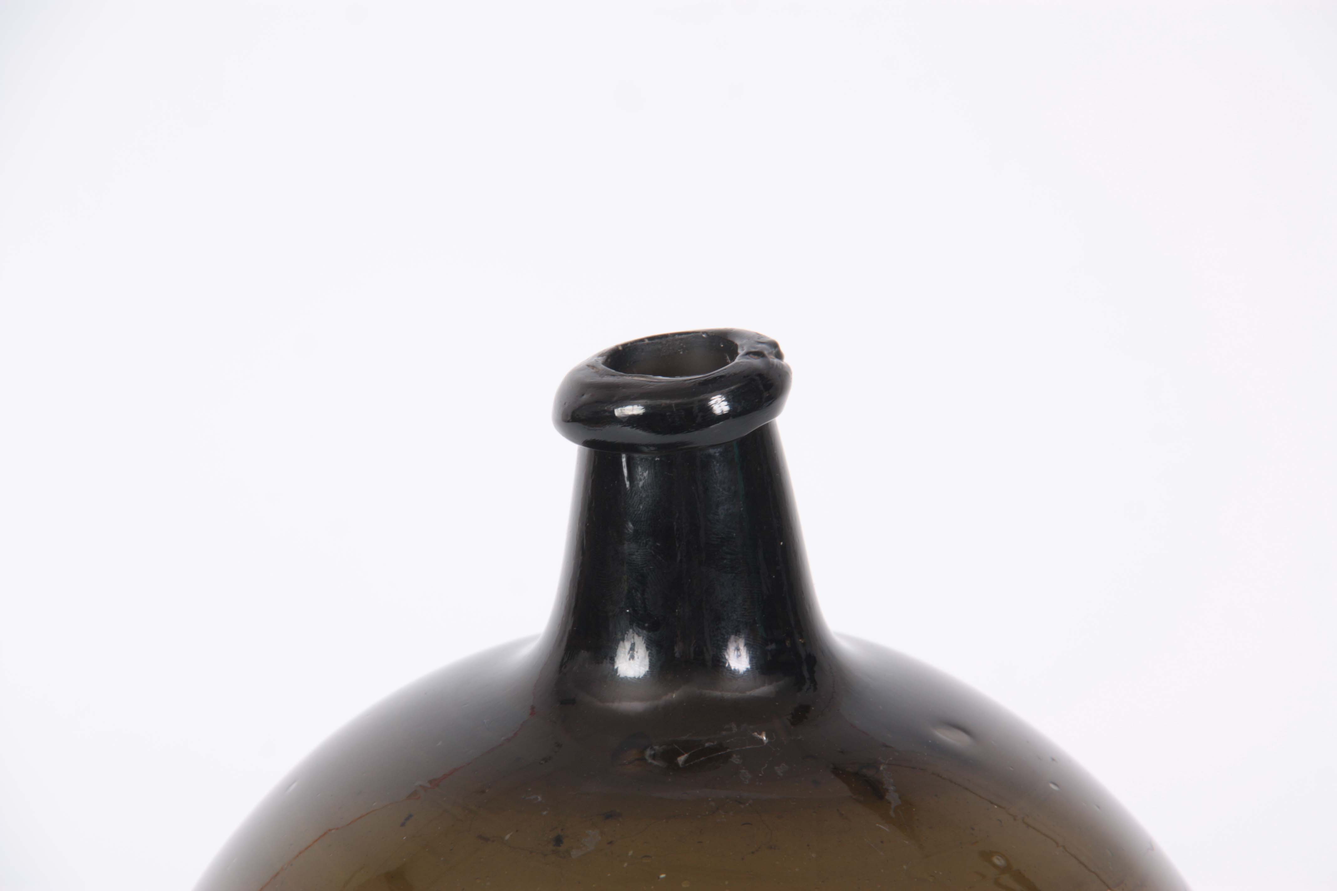 A LATE 18th CENTURY GREEN GLASS BOTTLE of bulbous form with a narrow neck, inscribed on the front - Image 4 of 4