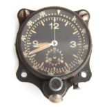 A GERMAN WW2 LUFTWAFFE NAVIGATOR'S COCKPIT CLOCK the black alloy case with rotating bezel