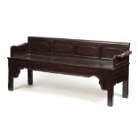 A 19TH CENTURY CHNESE HARDWOOD HALL BENCH with a panelled back and seat raised on square section