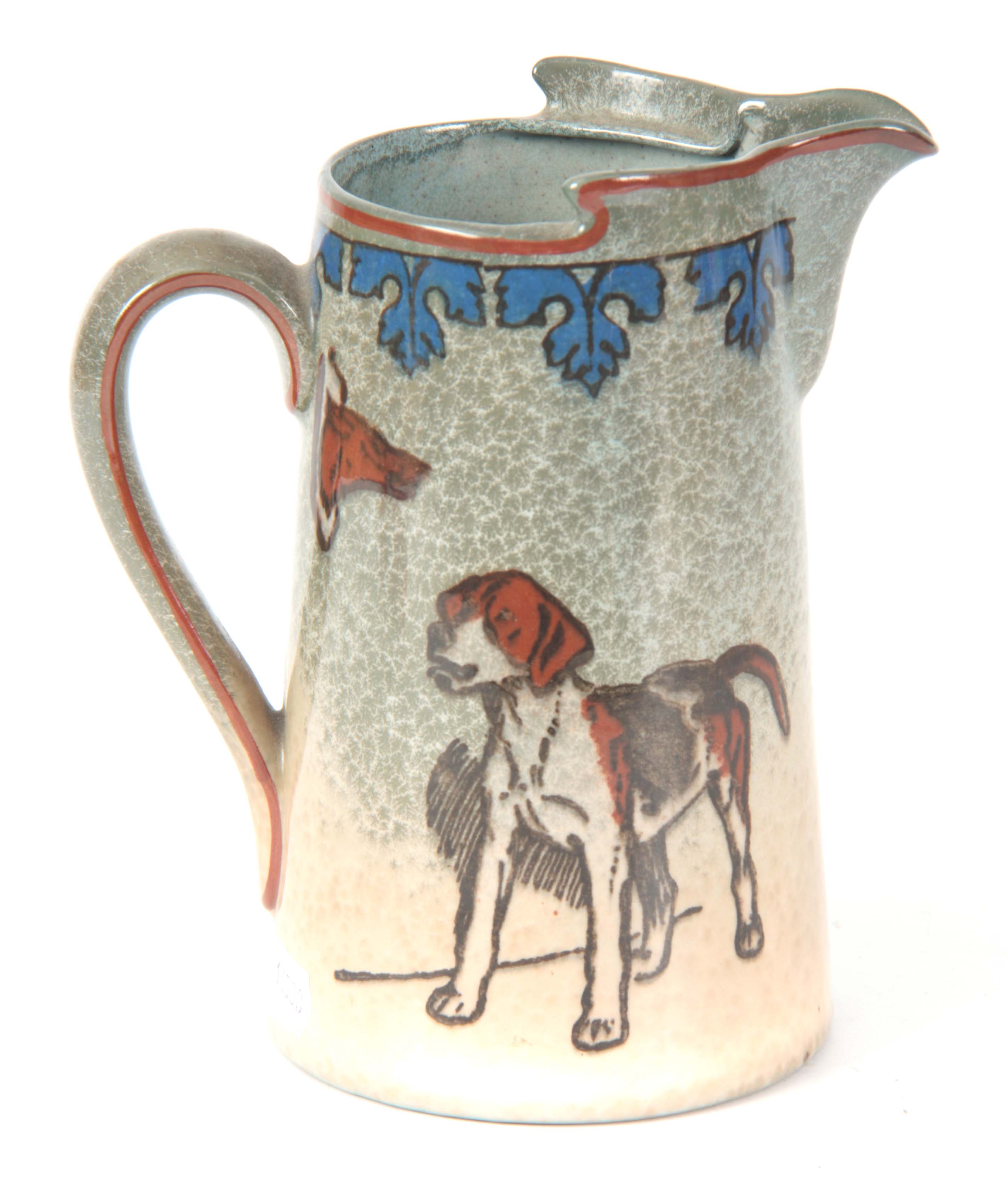 A CECIL ALDIN ROYAL DOULTON HUNTING JUG decorated with hounds and foxes mask 16.5cm high