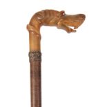 AN UNUSUAL 19TH CENTURY STACKED PAPER WALKING STICK WITH CARVED RHINO HORN HANDLE FORMED AS A