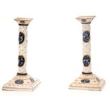 A PAIR OF 18TH CENTURY ENAMEL SQUARE BASED CANDLESTICKS with barley twist stems and square