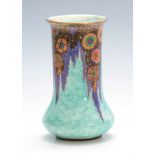 A CROWN DEVON FIELDINGS CYLINDRICAL VASE WITH BULBOUS BASE decorated enamelled flower heads on a