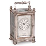 MAPPIN & WEBB, LONDON A SOLID SILVER ENGLISH DOUBLE FUSEE STRIKING CARRIAGE CLOCK made for the Bi-