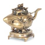 AN EARLY CHINESE CAST BRONZE CENSOR the shaped pierced top and separate stand having fruits and