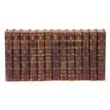 A SET OF 13 18TH CENTURY LEATHER BOUND BOOKS