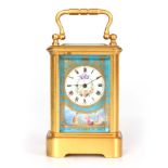 A LATE 19TH CENTURY FRENCH SEVRES PANELLED MINIATURE GILT-BRASS CARRIAGE CLOCK the Corniche case set