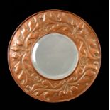 A WILLIAM MAWSON KESWICK HOME INDUSTRIES ARTS AND CRAFT CIRCULAR COPPER MIRROR with bevelled glass