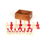A COMPLETE 19th CENTURY CARVED BONE & STAINED BONE CHESS SET the king 5.5cm high.