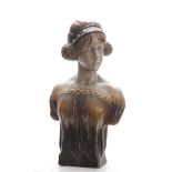 A STYLISH LATE 19TH CENTURY AUSTRIAN GOLDSHEIDER TERRACOTTA BUST modelled as a young lady wearing an