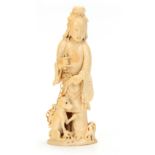 A FINE 19TH CENTURY CHINESE CARVED IVORY FIGURE depicted standing with chained dogs to foot 14cm