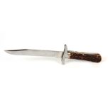 A 20TH CENTURY STAG HORN HANDLE FOLDING BOWIE KNIFE having a 6" blade with locking mechanism 27cm