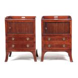 A PAIR OF GEORGE III MAHOGANY BOW FRONTED TAMBOUR FRONT BEDSIDE CUPBOARDS with raised gallery