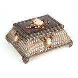 A STYLISH LATE 19TH CENTURY FRENCH SILVERED METAL JEWELLERY CASKET the tapered leaf cast body on