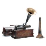 A LATE 19TH CENTURY EDISON HOME PHONOGRAPH in oak carry case with two metal horns and a model-C