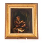AFTER GERARD DOU A 19TH CENTURY OIL ON TIN The dental operation 24cm high, 20cm wide - in gilt