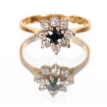 A LADIES 18CT GOLD SAPPHIRE AND DIAMOND CLUSTER RING set in a white gold claw app. 2.5g