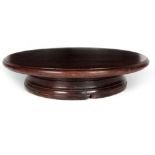 A 19TH CENTURY MAHOGANY LAZY SUSAN 41cm diameter.