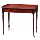 AN EARLY 19TH CENTURY DRESSING TABLE IN THE MANNER OF GILLOWS with raised gallery back above three