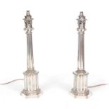A GOOD PAIR OF 19TH CENTURY SILVER PLATED ELECTRIFIED TABLE LAMPS LABELLED GARDNER'S STRAND.