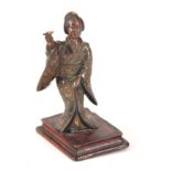 A JAPANESE MEIJI PERIOD FIGURAL BRONZE depicting an oriental lady mounted on a hardwood base 12cm