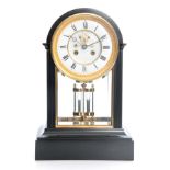 A 19TH CENTURY BLACK SLATE FRENCH MANTEL CLOCK the 7" enamel dial with visible Brocot escapement and