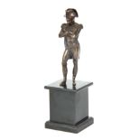A LATE 19TH CENTURY BRONZE FIGURE OF NAPOLEON standing on a square black slate base 33cm high.