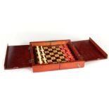 A LATE 19TH / EARLY 20TH CENTURY JACQUES TYPE MAHOGANY TRAVELLING CHESS SET with hinged inner
