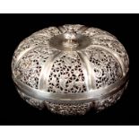 A 19TH CENTURY ASIAN WHITE METAL/SILVER PIERCED POT POURRI LIDDED BASKET having repousse floral