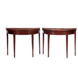 A GOOD PAIR OF GEORGE III FIGURED MAHOGANY DEMI LUNE CARD TABLES of original colour and patina, with