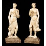 A PAIR OF LATE 19TH CENTURY NEO-CLASSICAL CARVED IVORY STATUES mounted on grey marble moulded