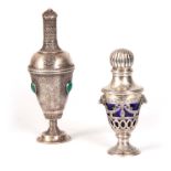 AN UNUSUAL CONTINENTAL / ISLAMIC SILVER JEWELED BOTTLE WITH STOPPER having chaise work decoration