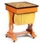 A 19TH CENTURY LATE REGENCY FIGURED SATINWOOD WORKBOX with a penwork chessboard top depicting