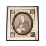 A LATE 19TH CENTURY OVAL MINIATURE HALF LENGTH PORTRAIT OF A YOUNG LADY 6cm high 5cm wide - in