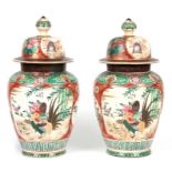 A LARGE PAIR OF LATE 19TH CENTURY JAPANESE SATSUMA OVOID VASES AND COVERS with colourful panelled