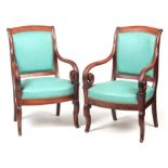 A PAIR OF 19TH CENTURY FRENCH BIEDEMIER STYLE FIGURED MAHOGANY UPHOLSTERED OPEN ARMCHAIRS having