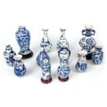 A COLLECTION OF 19TH CENTURY MINIATURE CHINESE BLUE AND WHITE VASES of various sizes, some