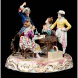 A LATE 19TH/EARLY 20TH CENTURY MEISSEN STYLE CONTINENTAL LARGE FIGURE GROUP depicting figures around
