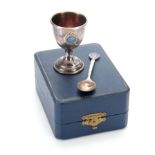 A CASED SILVER AND ENAMEL GEORGE VI CORONATION EGG CUP AND SPOON - W H Haseler Ltd, Birmingham1936