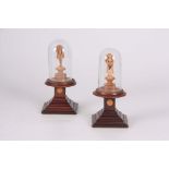 A PAIR OF LATE 19TH CENTURY CONTINENTAL MINIATURE CARVED FIGURES modelled as a male and female