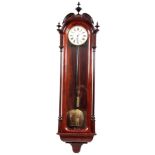 A GIANT-SIZED FIGURED WALNUT 8-DAY VIENNA REGULATOR WALL CLOCK with enamel dial having Roman