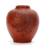 A CHINESE YIXING TERRACOTTA VASE engraved with a dragon and tree in a mountainous background, the