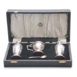 A CASED SILVER CONDIMENT SET with original blue glass liner, app 4.7 troy oz. not including liners -
