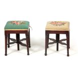 A PAIR OF LATE GEORGIAN MAHOGANY ADJUSTABLE SQUARE PIANO STOOLS with turned tapering legs joined