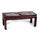 A 19TH CENTURY CHINESE HARDWOOD COFFEE / ALTAR TABLE with two inset Famille Verte porcelain panels